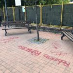Graffiti sul piazzale dedicato al ricordo di Giorgio Buzzi, comportamento deprecabile dei giovani di Campo di Carne